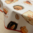 Скатерть Tag 3574 CHEESE CAKE Д.150 с защитным покрытием PVC